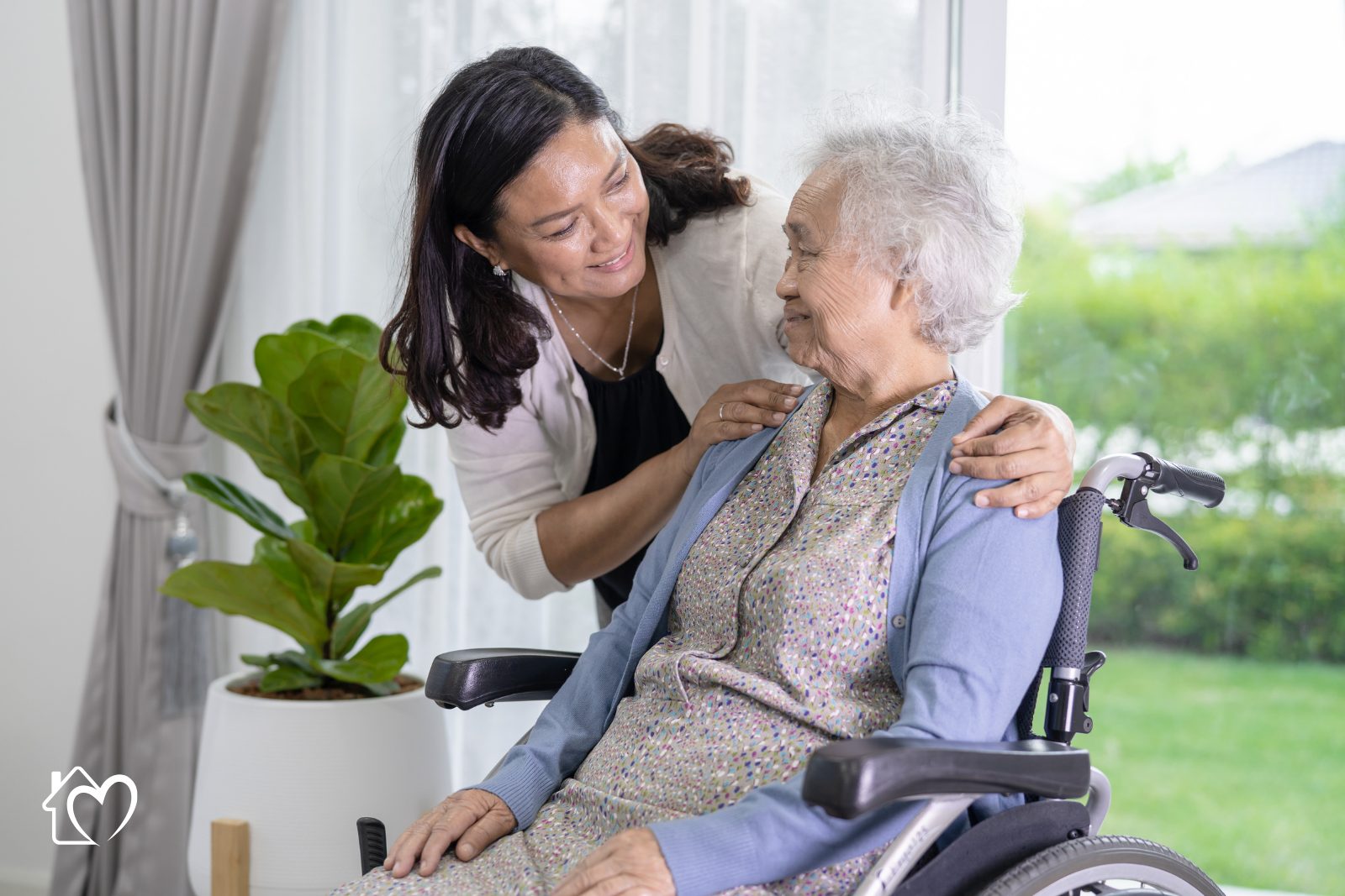 A care coordinator explaining provider options to an older couple